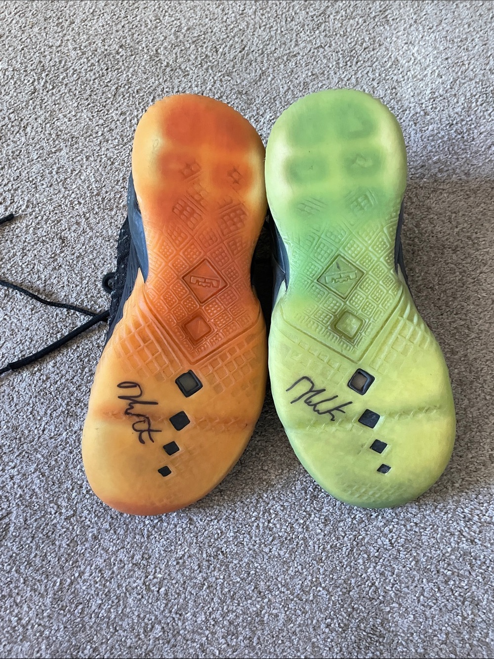 **signed by Derrick White**Nike Kids Black Sneakers with Orange and Lime
